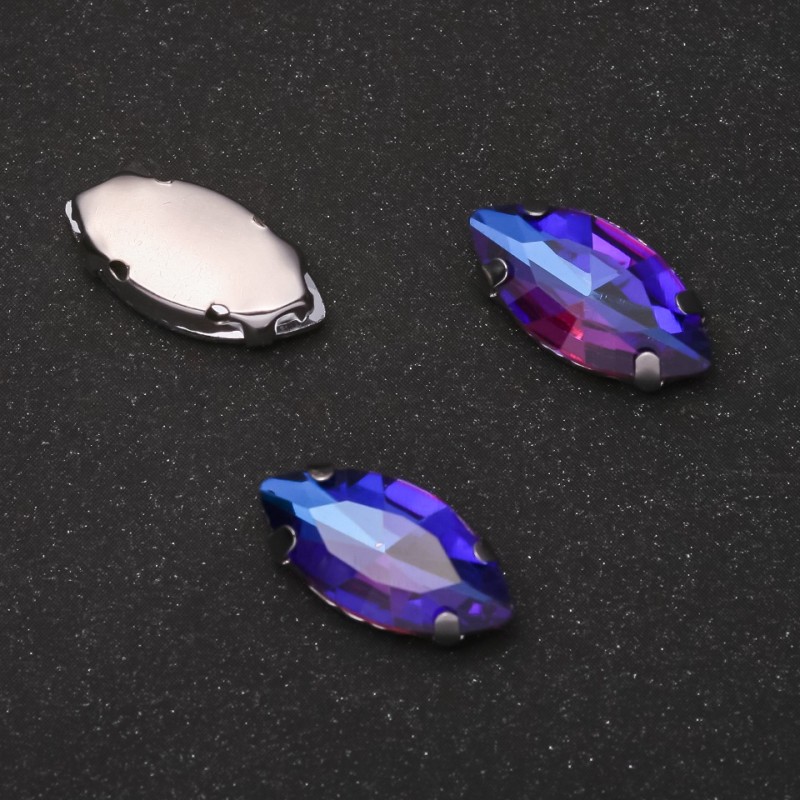 Preț pentru pachet /10 buc. Cristal cusut în cap oval 9×18 mm, albastru-vișiniu