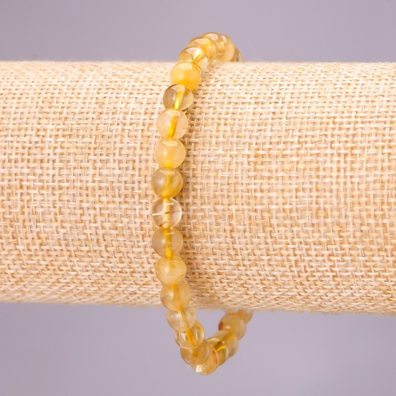 Brățară din cuarț rutilit natural, pe elastic, bile lucioase, diametrul aproximativ de 6 mm, lungimea 18 cm