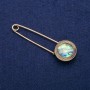 Broșă cu cabochon Halit 23×75 mm, metal auriu