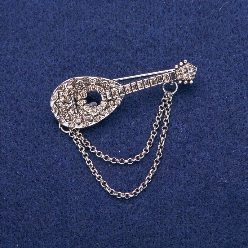 Broșă «Lăută» cu strasuri gri, 17×50 mm, metal argintiu