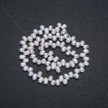 Нитка річкового перлів, діаметр 6х4мм, довжина 36см + - з відливом бензин