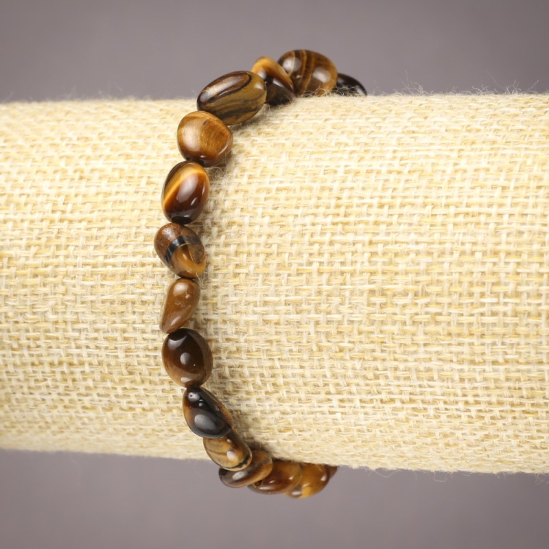 Brățară pe elastic din piatră naturală, ochi de tigru, cu fațetare, diametrul 6×8 mm