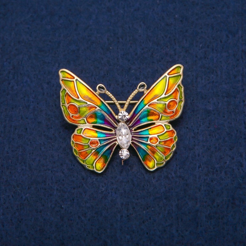 Broșă Fluture cu cristale albe și email multicolor, metal auriu 31×37 mm