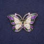 Broșă în formă de fluture mov, email mov, cristale albe, 45×28 mm, metal galben