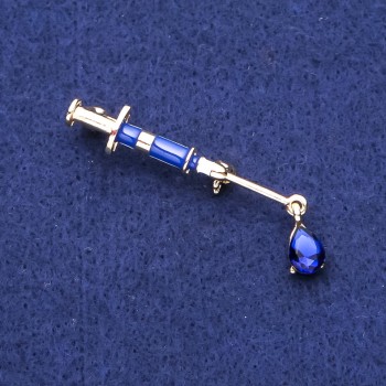 Broșă «Seringă» cu cristal albastru, metal auriu, 10×45 mm