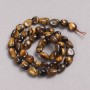 Mărgele pe șnur din piatră naturală ochiul de tigru, fațetate, diametrul 6×8 mm ±, lungime 39 cm