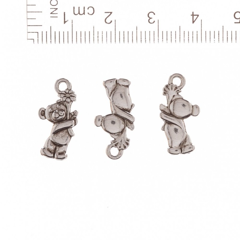 Pandantiv ursuleț cu floare 19×10 mm, ambalaj 20 g ± 21 buc