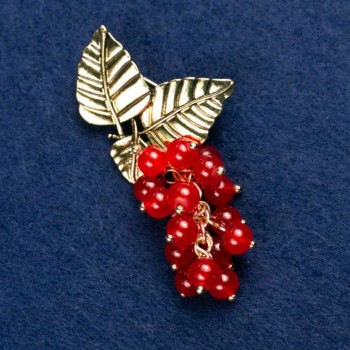 Broșă cu carneol natural «Ramură cu fructe», culoare aurie a metalului 60x35 mm