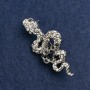 Broșă «Șarpe» cu cristale albe și negre, metal argintiu închis 55×25 mm