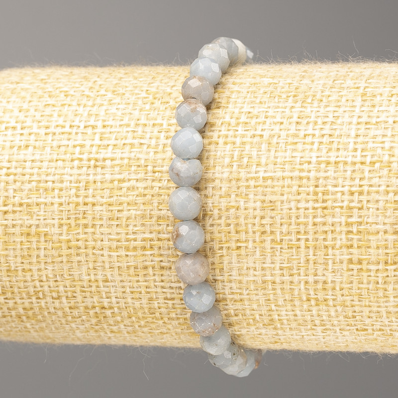 Brățară din acvamarin natural, mărgele tăiate pe fir elastic, diametrul aproximativ 5 mm, lungime 18 cm