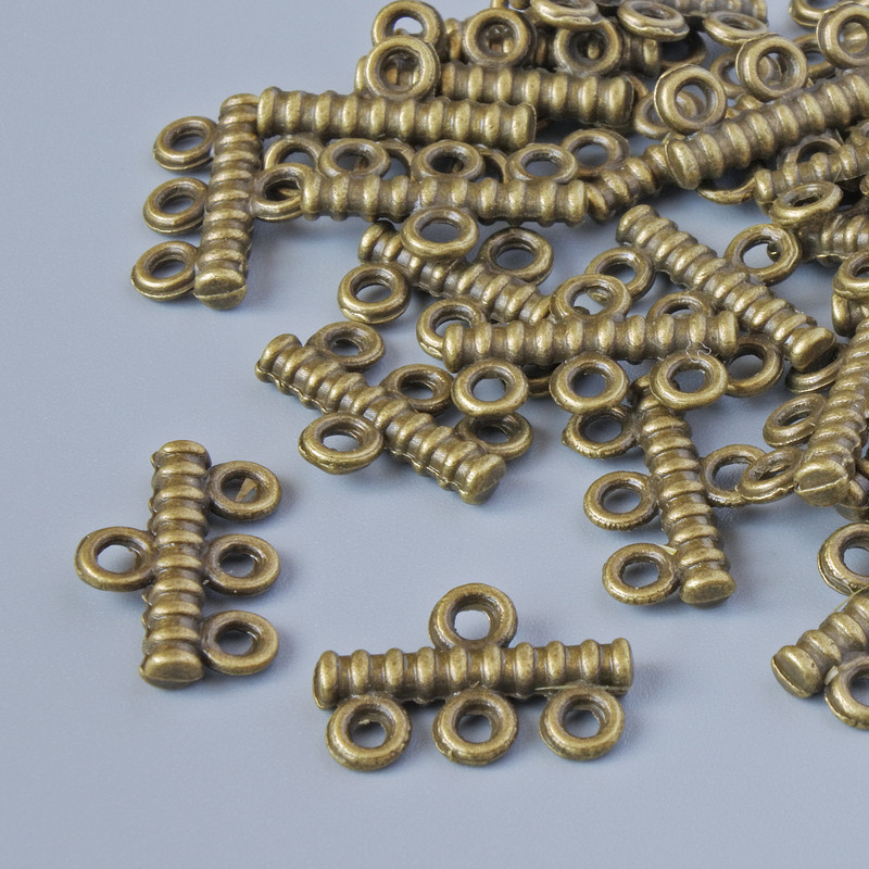 Conector pentru 3 șnururi, diametrul 14×9 mm, diametrul găurii 1,8 mm, ambalaj 30 bucăți ±, culoare bronz metal