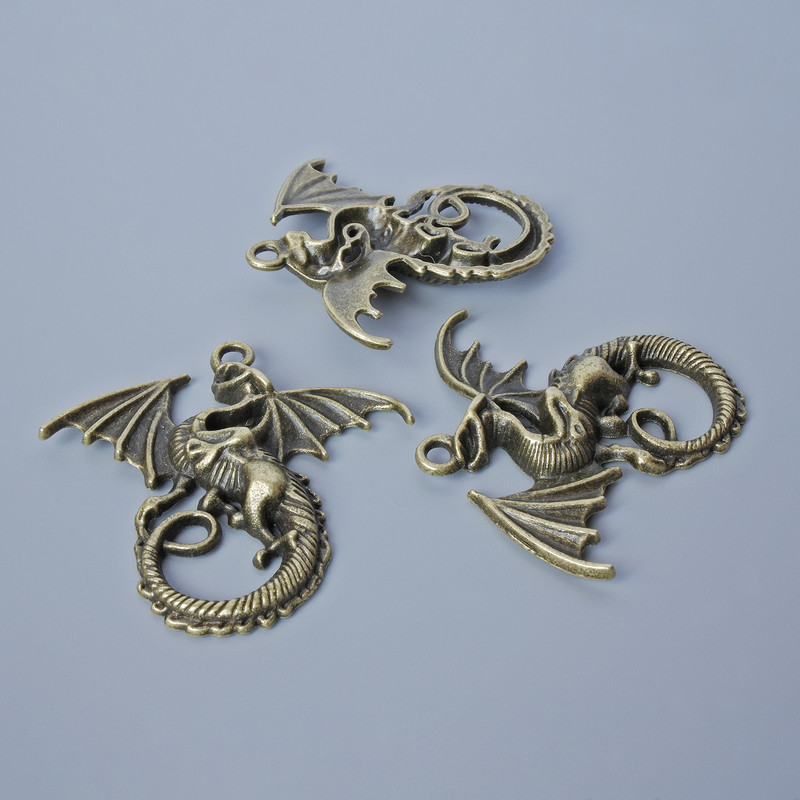 Furnitură pandantiv „Dragon”, dimensiuni 43×45 mm, grosime 5 mm, diametrul găurii 2,8 mm, ambalaj: 1 bucată, culoare bronz metalic