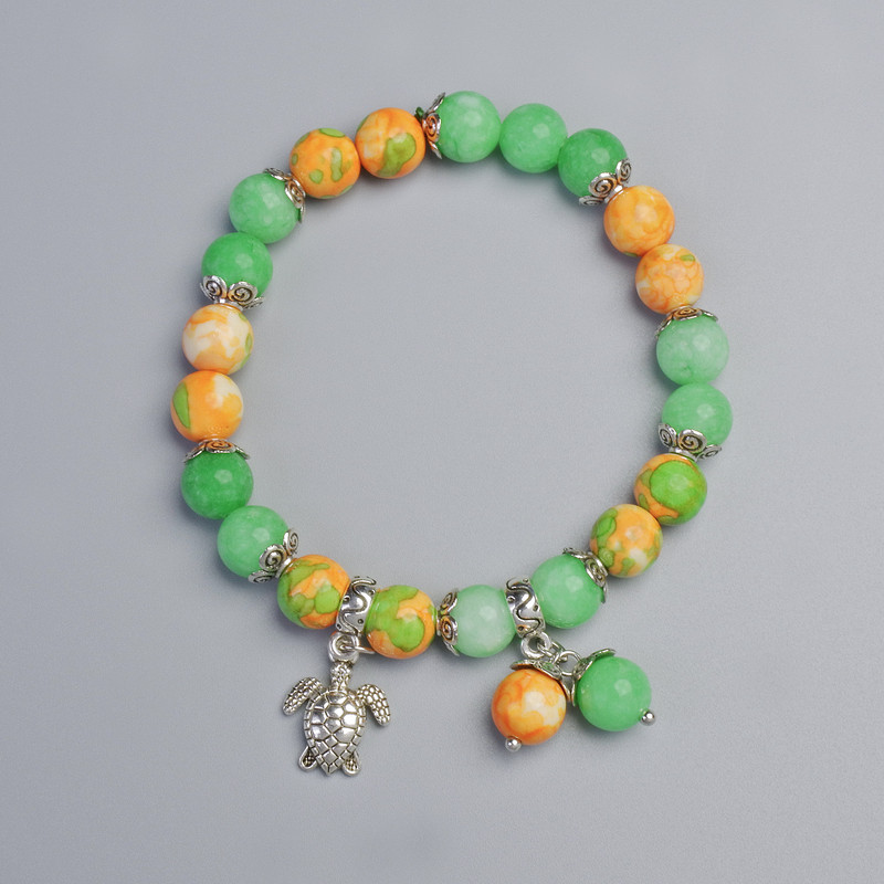 Браслет "Варисцит" (штучний акрил) та Нефрит (штучний), діаметр 8, 5мм+- (стрейч), довжина 18см+- з металевими вставками