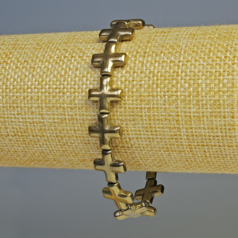 Brățară din hematit în formă de cruci, culoare bronz deschis, diametrul 12,5×12,5 mm, lungime 18 cm, bandă elastică
