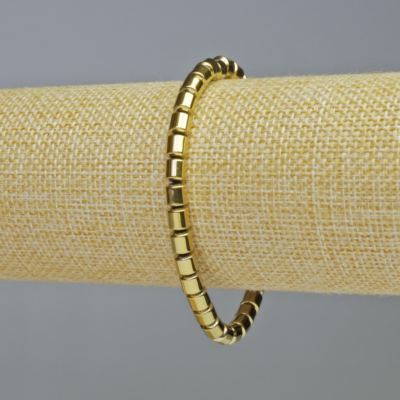 Brățară hematit cilindric, culoare aurie, diametrul 5x5 mm, lungime 18 cm, pe elastic