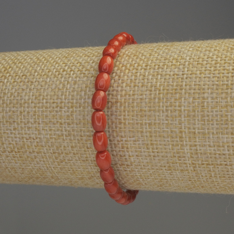 Brățară din coral portocaliu, formă baril, diametrul 6x5 mm, lungime 18 cm, pe elastic