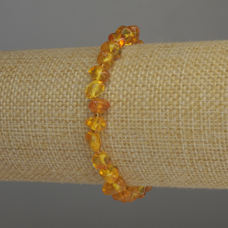 Brățară din chihlimbar fațetat, diametrul 7x5 mm, mărgele 2 mm, lungime 18 cm, pe elastic