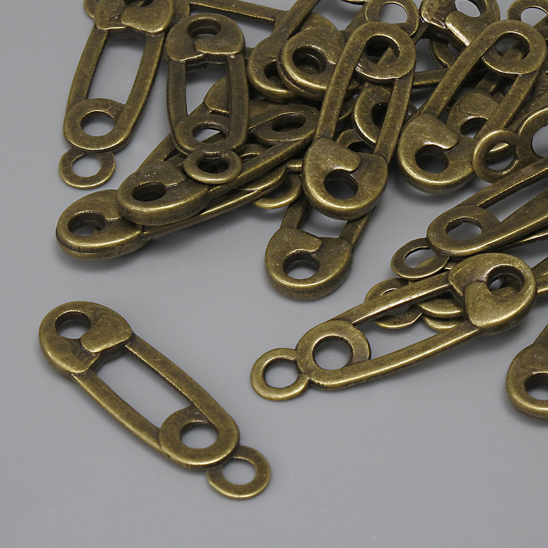 Pandantiv-știft în culoare bronz vechi, diametrul 23×7 mm, gaură pentru cercei de aproximativ 2,2 mm, ambalare 22 buc.