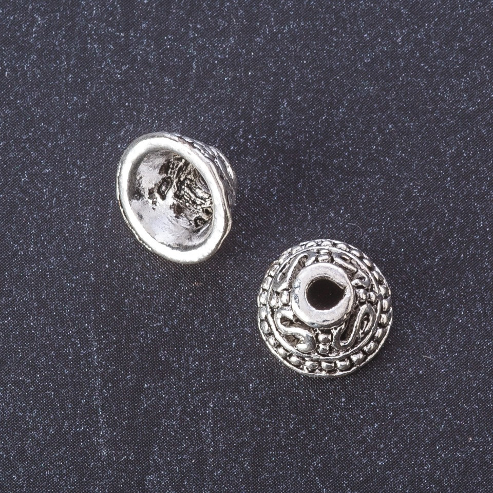 Furnitură cap de șnur culoare metalică argintiu, diametrul 11 mm, d2-7 mm, d3.5 mm fațetat, 20 g ±10 buc.