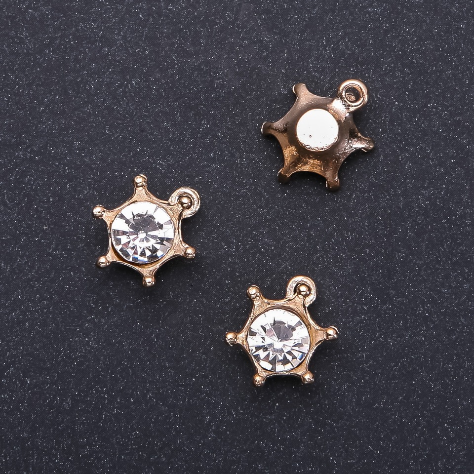 Furnitură pentru pandantiv Coroană aurie cu cristal, diametrul 16 mm, lungimea 18 mm, ambalare 8 buc. (+ -)