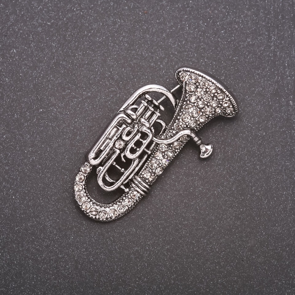 Broșă în formă de tubă, cu strasuri, din metal gri, 47x25 mm