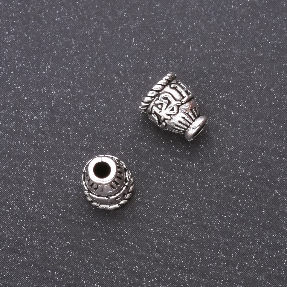 Furnitură – capac pentru mărgele, 9×7×4 mm, diametru interior 2,5–4 mm, ambalare 20 g (24+ buc.) Culoare: argintiu metal