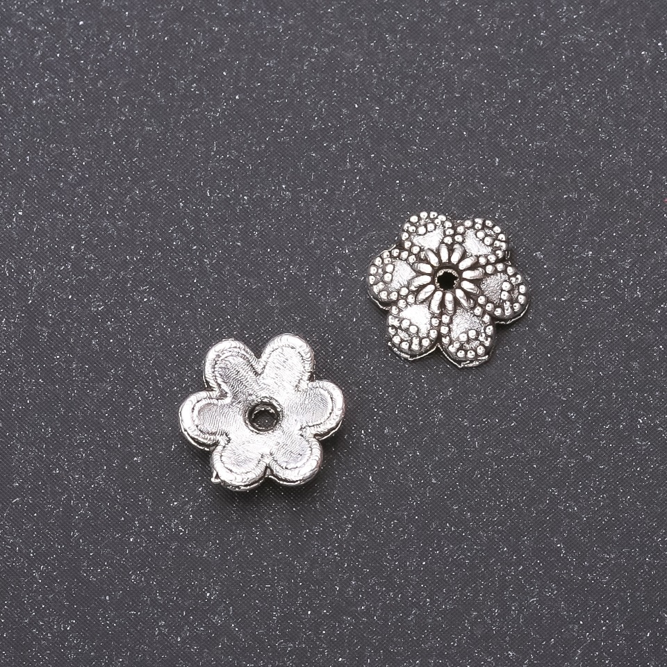 Capăt pentru mărgele, 9 mm, diametrul interior 1,8 mm, ambalaj 20 g (48 +/- buc.). Culoare: metal argintiu