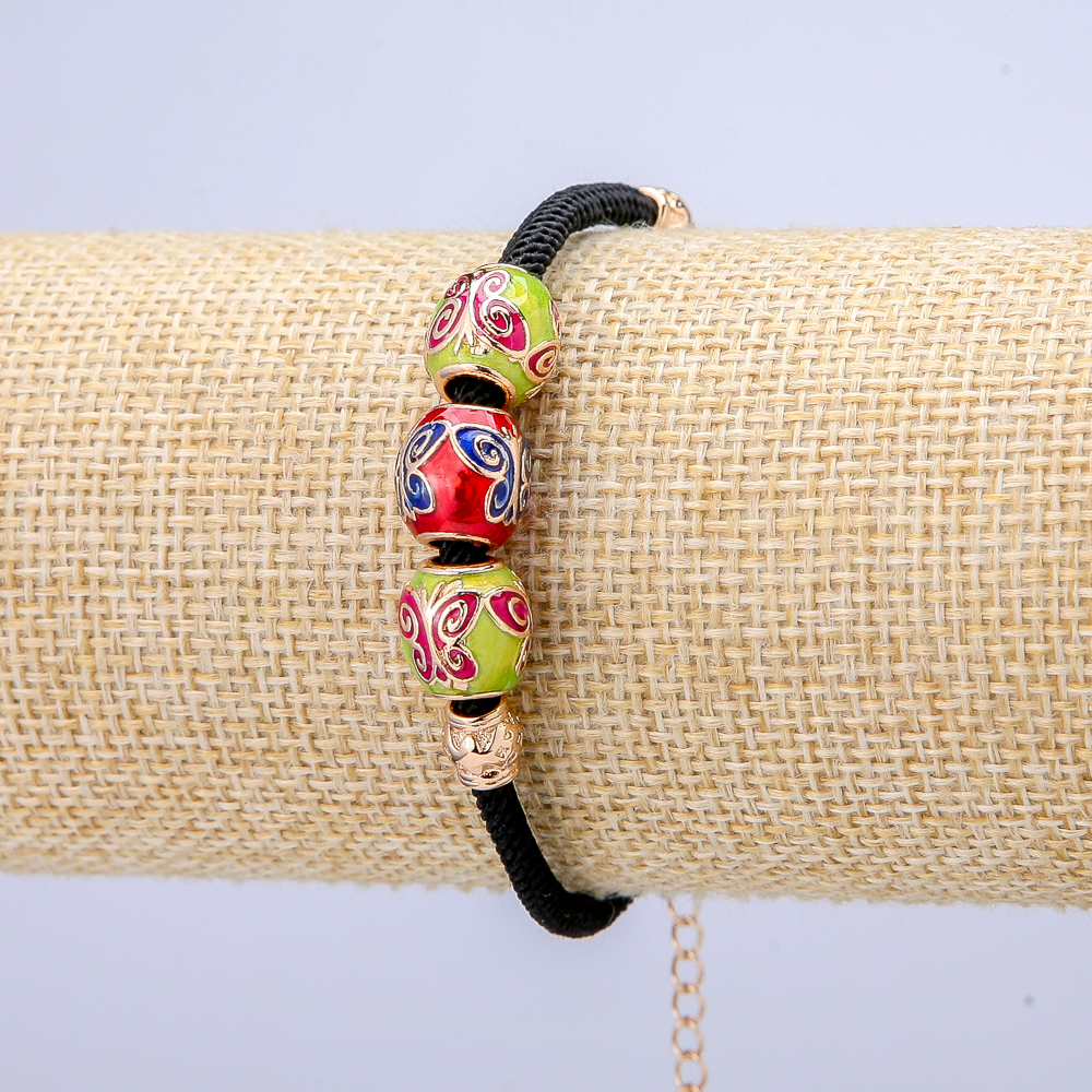 Brățară Xuping placare cu aur 18K cu mărgele în formă de fluturi pe șnur, grosime 3 mm +/- , diametru 10 mm +/- , lungime 18-22 cm +/-