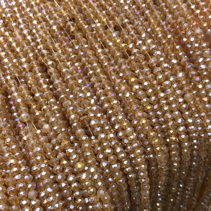 Mărgele din cristal ceh pe fir portocaliu-piersic transparent, cu luciu de benzină, rondel tăiat, diametru 3x2,5 mm, lungime 36 cm